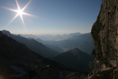 Sunrise on via ferrata clipart