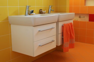 Washbasin in modern bathroom clipart