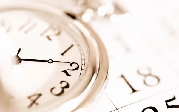Relógio de bolso e calendário — Fotografia de Stock