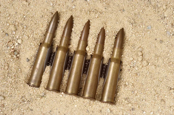 Ammunition on the sand — Stock Photo, Image