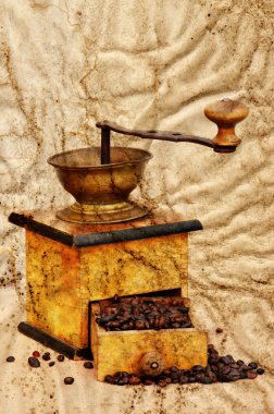 Coffee mill and beans in grunge style clipart