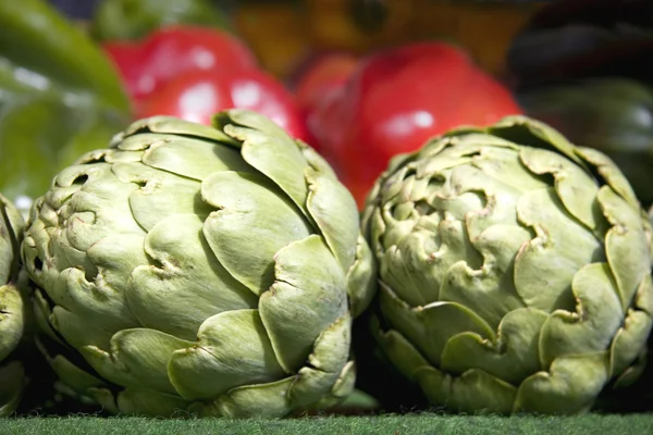 Artichokes and peppers — Stock Photo, Image