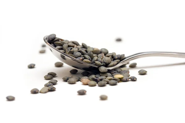 Uma colher de lentilhas — Fotografia de Stock