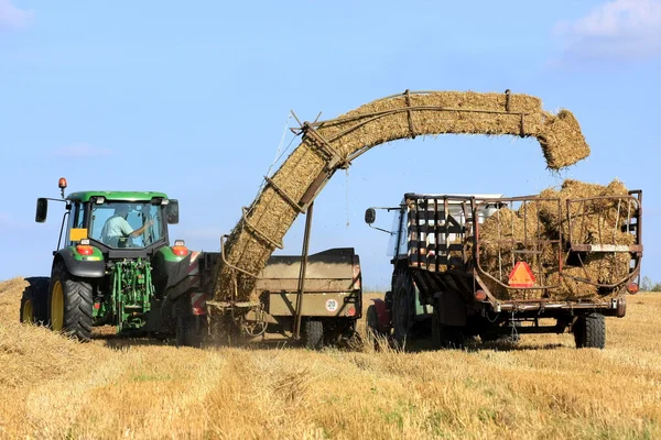 Straw bale and agricultural engineering — Stock Photo, Image