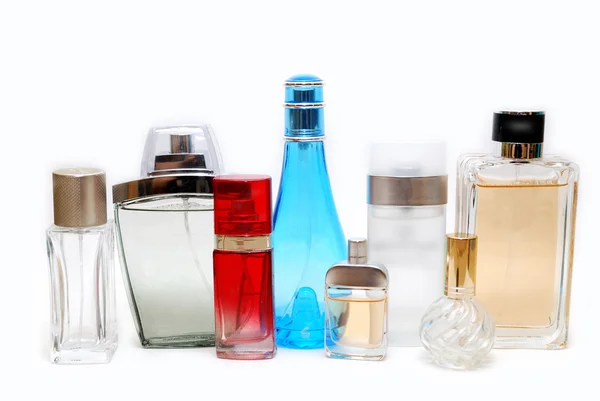 Вісім пляшок парфумів — стокове фото