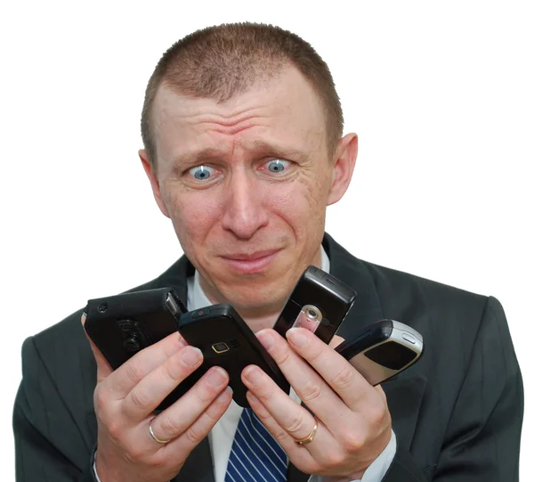 Businessman with cell phones — Stock Photo, Image