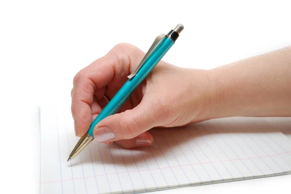 Uma mão segurando uma caneta e escrevendo — Fotografia de Stock