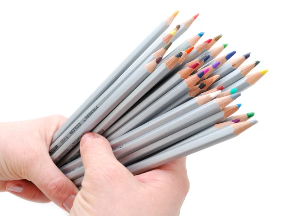 İki elini tutarak renkli kalemler — Stok fotoğraf