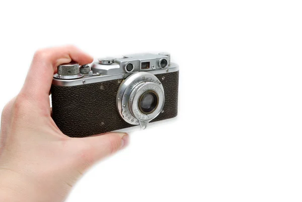 Mão segurando a câmera — Fotografia de Stock