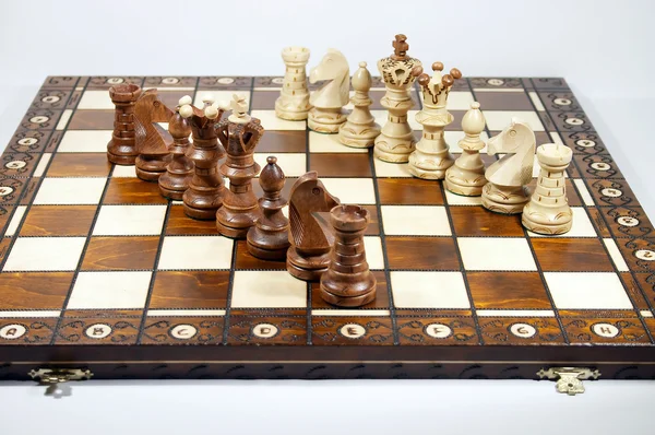 Two lines of chessmen on chessboard — Stock Photo, Image