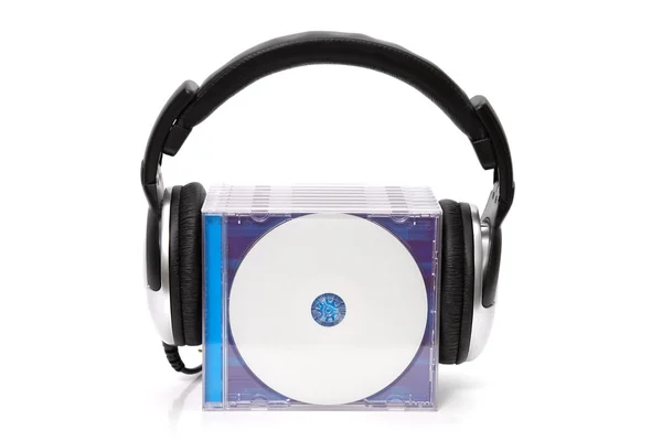 Headphones with stack of cds — Stock Photo, Image
