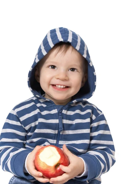 Laughing baby with red apple — Stock Photo, Image