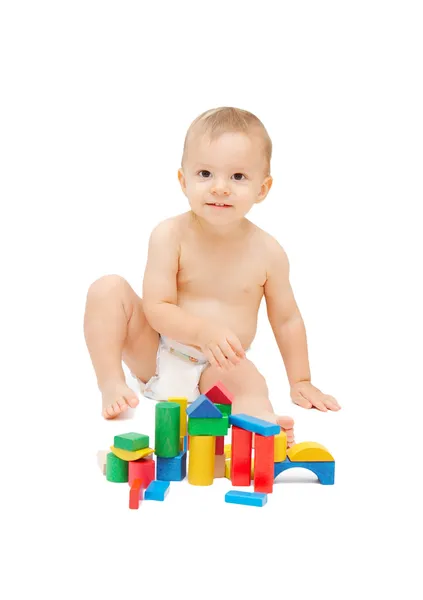 Bebê brincando com blocos de cores — Fotografia de Stock