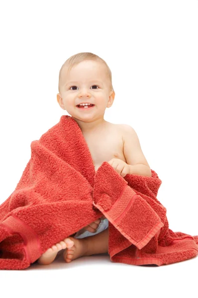 Dziecko w ręcznik, siedząc na podłodze — Zdjęcie stockowe