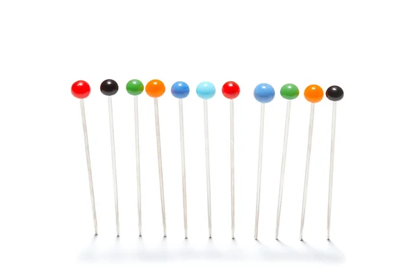 Pins in a row — Stock Photo, Image