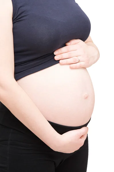 孕妇持她的腹部 — 图库照片