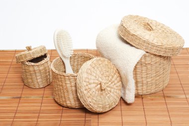 Woven baskets with bath accessories clipart