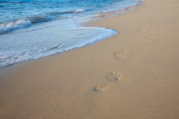 stock image Footprints in the sand