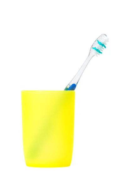 Zahnbürste in einer Tasse — Stockfoto