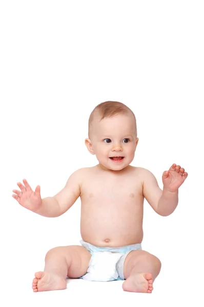 Smiling baby sitting on the floor — Stock Photo, Image