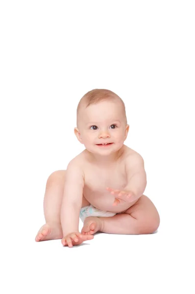 바닥에 앉아 미소짓는 아기 — 스톡 사진