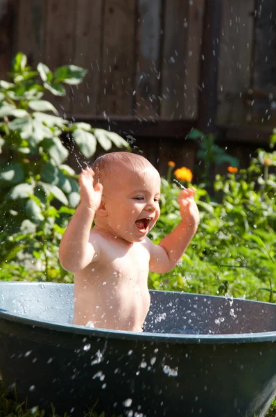 Outdoor baby bathing — Stock Photo, Image