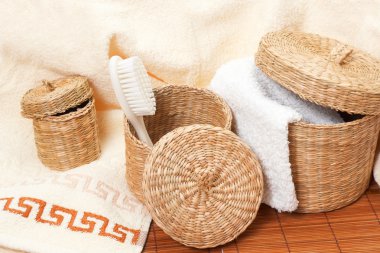 Woven baskets with bath accessories clipart