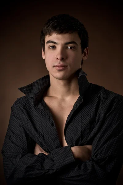 stock image Young man with unbuttoned shirt