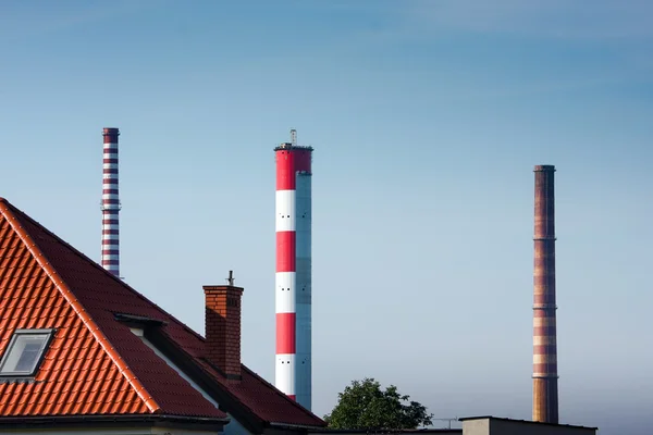 Stock image Chimneys over the house