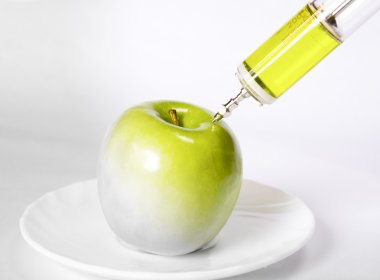 Apple with a syringe clipart