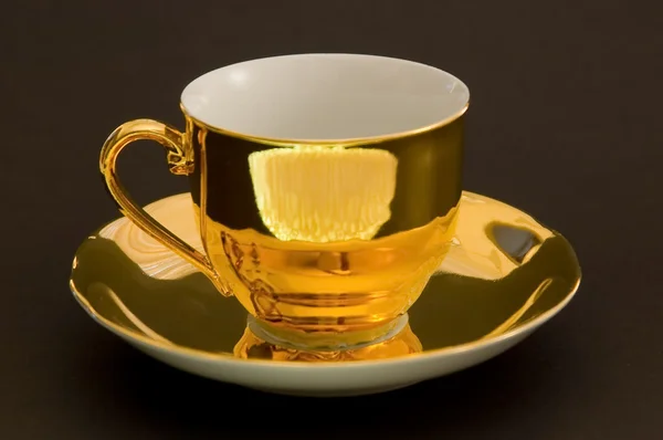 Golden coffee cup