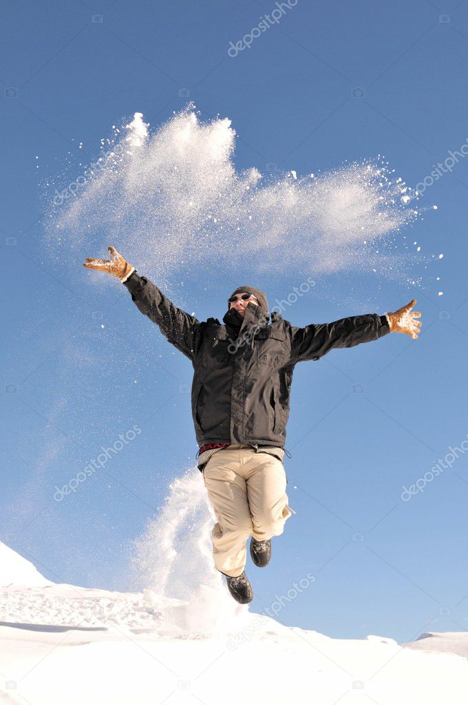 Man is jumping in the snow