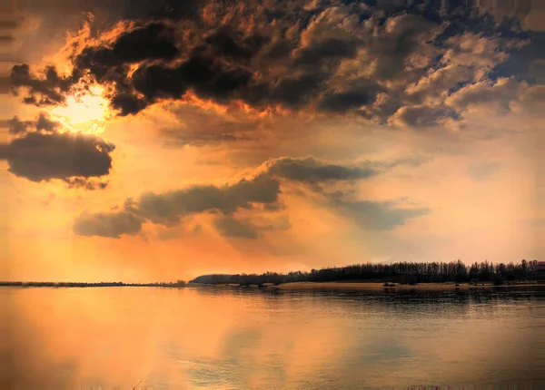 Západ slunce u řeky Stock Fotografie