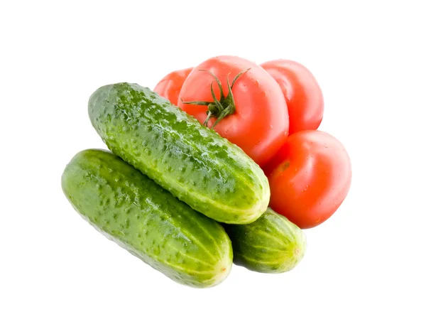 Färska tomater och gurkor — Stockfoto