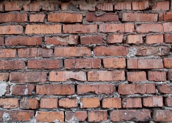 Antiguo muro de ladrillo dañado —  Fotos de Stock