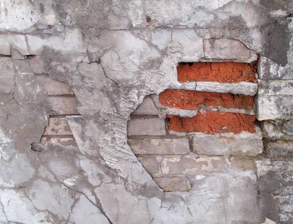 Alte beschädigte Ziegelmauer — Stockfoto