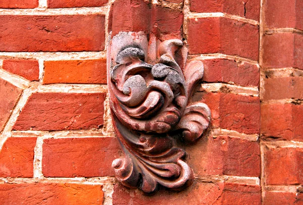 Ornate Decorations on Red Brick Wall — Stock Photo, Image