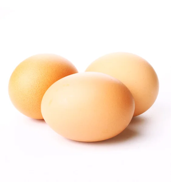 stock image Three chicken eggs on a white background