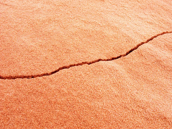 Crack in sand — Stock Photo, Image