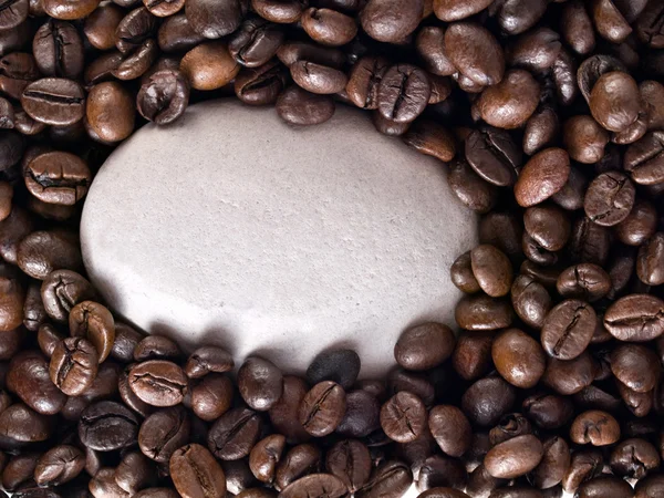Coffee beans and stone — Stock Photo, Image