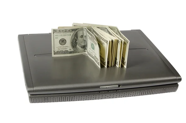 Dollars and the laptop — Stock Photo, Image
