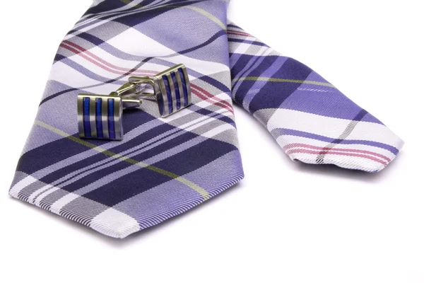 kravat ve kol düğmeleri