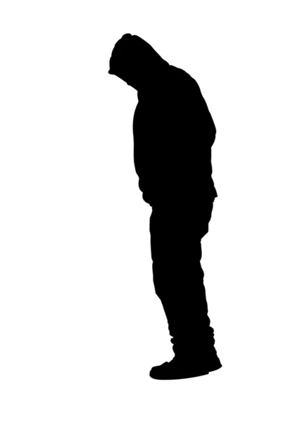 Человек, стоящий на пальцах ног в капюшоне Стоковое Фото