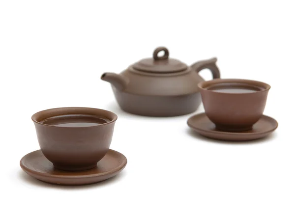 Dwie filiżanki herbaty i brązowy czajnik — Zdjęcie stockowe