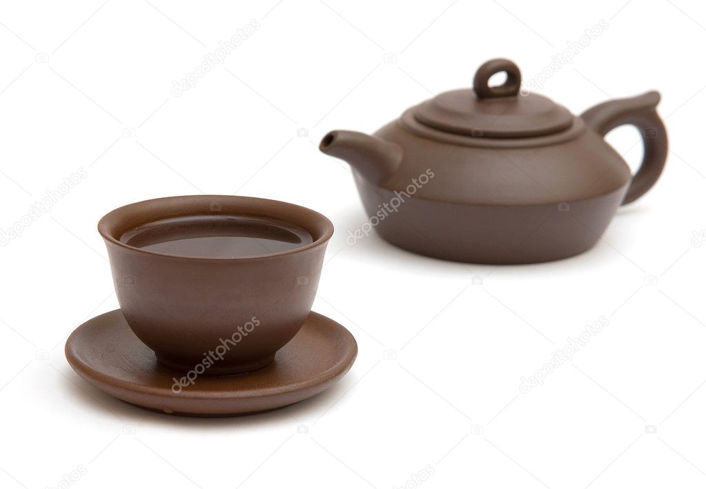 The cup of tea and teapot