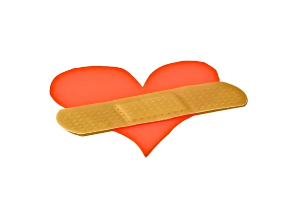 Heart with band-aid Royalty Free Stock Photos