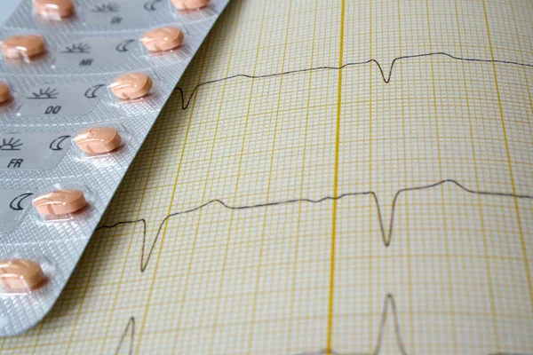 stock image ECG with drugs