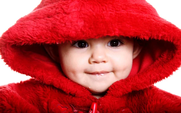 Baby in het rood Stockfoto