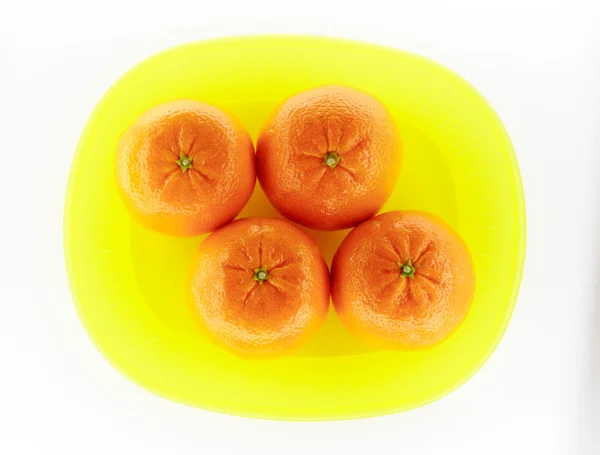 Tangerines sur plaque jaune — Photo