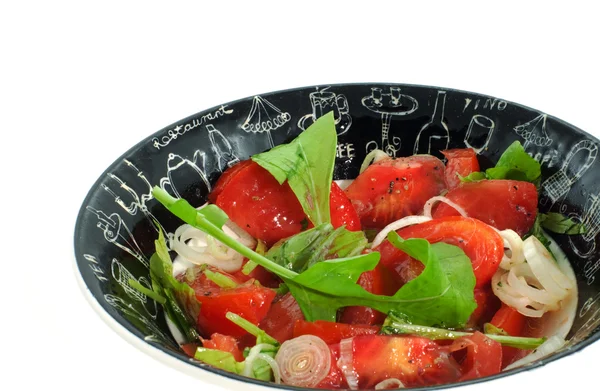 Салат из помидоров в миске — стоковое фото